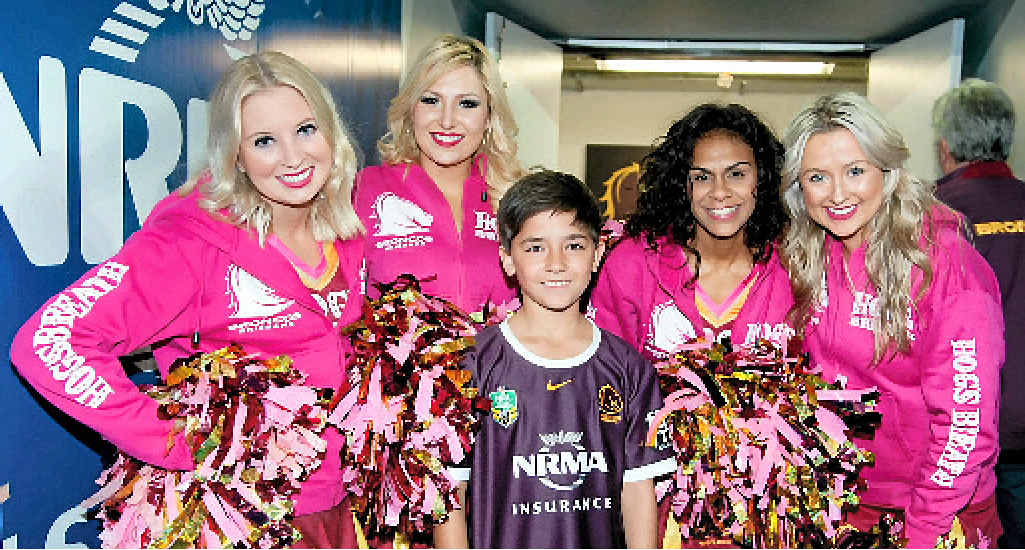 BIG FAN: (Top) Sebastian Lopez (left) holding Brisbane Broncos captain Justin Hodges’ hand. (Left above) Lopex with Broncos’ cheerleaders. (Right above) Sebastian with Broncos mascot. BIG FAN: (Top) Sebastian Lopez (left) holding Brisbane Broncos captain Justin Hodges’ hand. (Left above) Lopex with Broncos’ cheerleaders. (Right above) Sebastian with Broncos mascot.